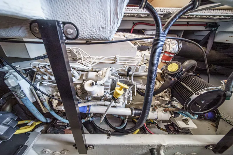 Slide: The Image of Engine compartment of a 2005 Meridian 381 Sedan, showcasing intricate mechanical components. - 28