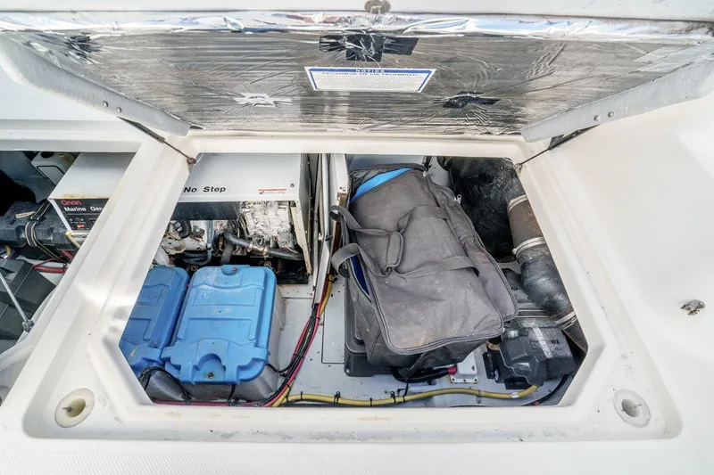 Slide: The Image of Engine compartment of a 2005 Meridian 381 Sedan with equipment and storage. - 31