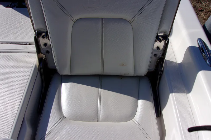 Slide: The Image of White seat on 2018 Blue Wave 2200 PureBay boat, showing slight wear. - 10