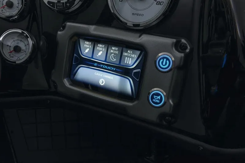 Slide: The Image of Open storage compartment in a 2020 Nitro ZV21 boat, featuring a blue interior. - 20