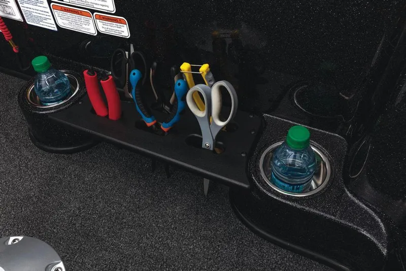 Slide: The Image of 2020 Nitro ZV21 boat covered, on trailer, in indoor showroom. - 25