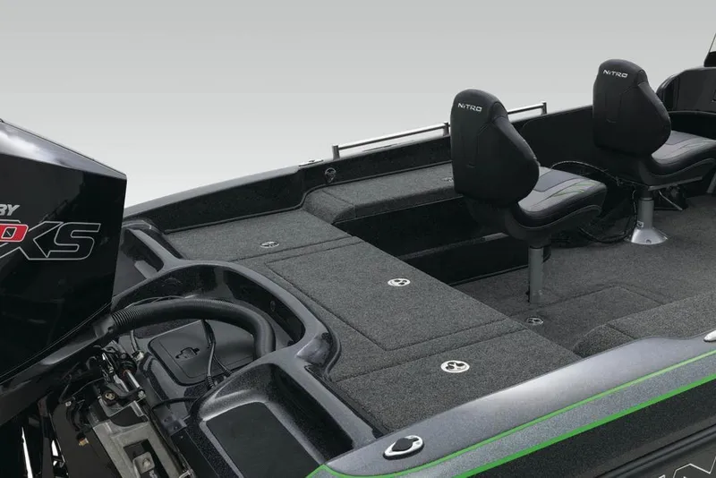 Slide: The Image of Covered 2020 Nitro ZV21 boat in showroom with other boats in background. - 26