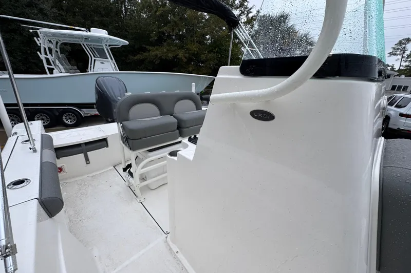 Slide: The Image of 2026 Sea Born LX21 Center Console boat with seating and console details. - 23