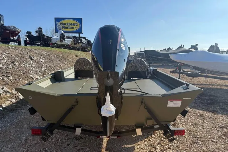 Slide: The Image of 2026 Lowe Roughneck 2070 boat with outboard motor at BlackBeard Marine dealership. - 5