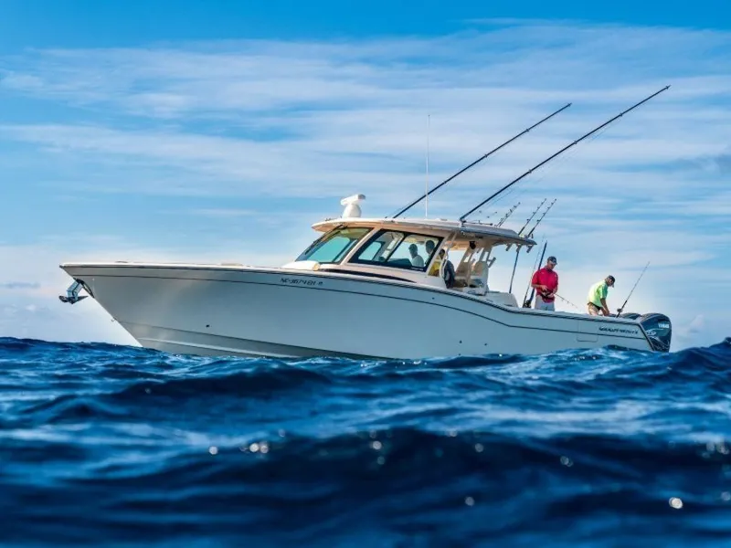 Slide: The Image of Grady-White Canyon 456 boat 2026 on open sea. - 12