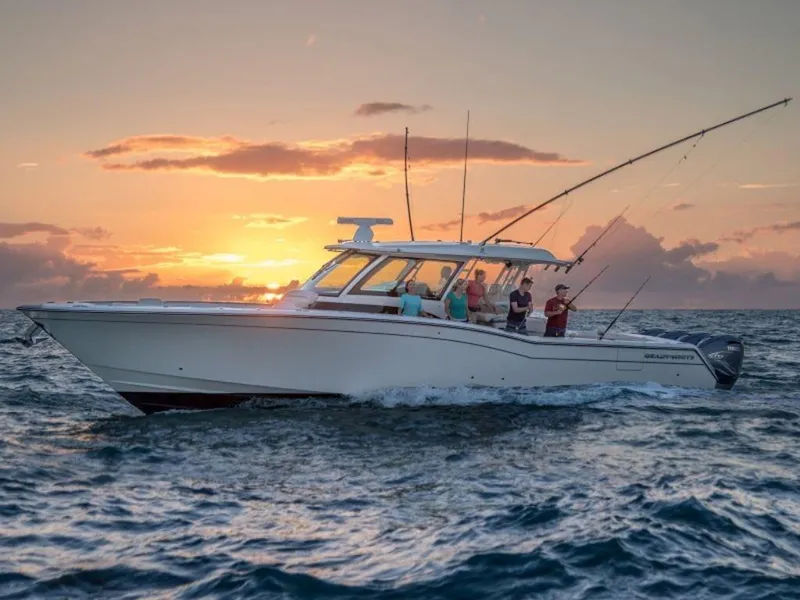 Slide: The Image of Grady-White Canyon 456 boat at sunset on the sea, 2026 model. - 13