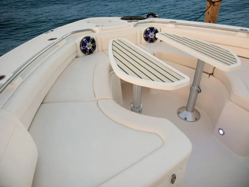 Slide: The Image of Grady-White Canyon 456 2026 with elegant seating and table. - 21