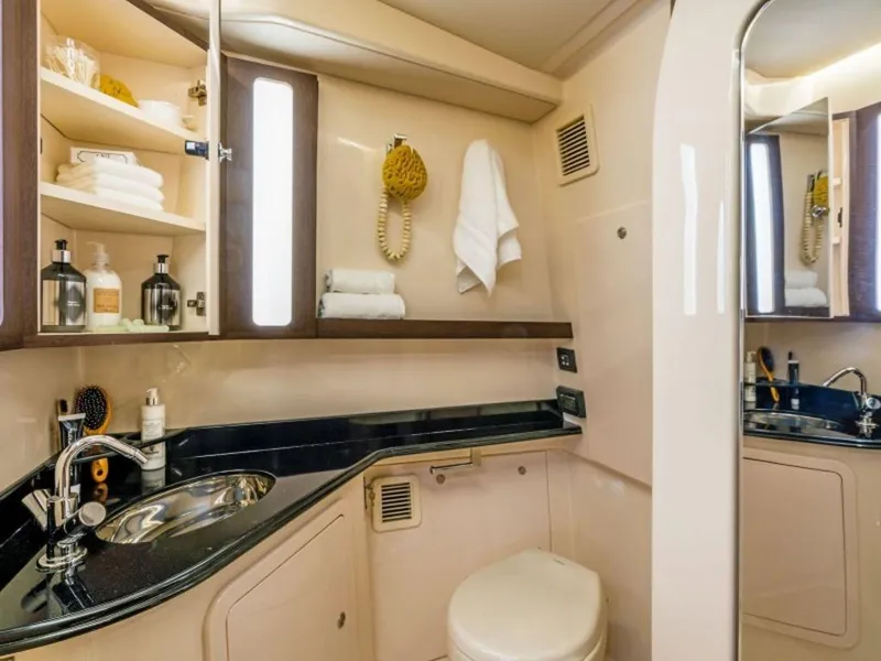 Slide: The Image of Luxurious bathroom in the 2026 Grady-White Canyon 456 yacht. - 23