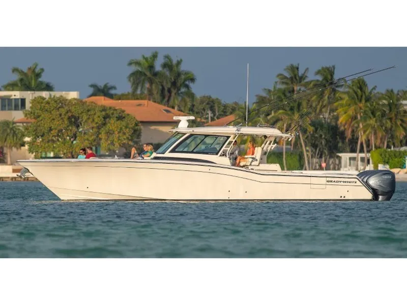 Slide: The Image of 2026 Grady-White Canyon 456 boat on calm water. - 3