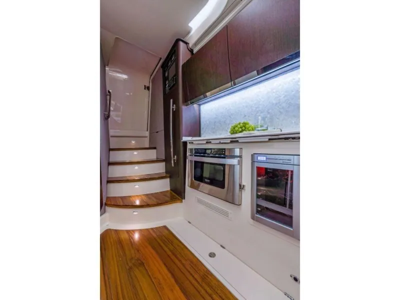 Slide: The Image of Interior of Grady-White Canyon 456 yacht, modern kitchen, 2026 model. - 30