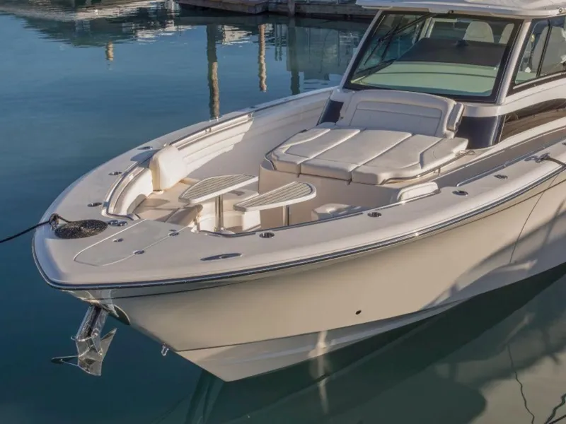Slide: The Image of Grady-White Canyon 456 boat, 2026 model, docked in calm water. - 33