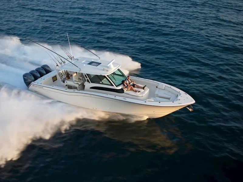 Slide: The Image of 2026 Grady-White Canyon 456 boat cruising on the ocean. - 4