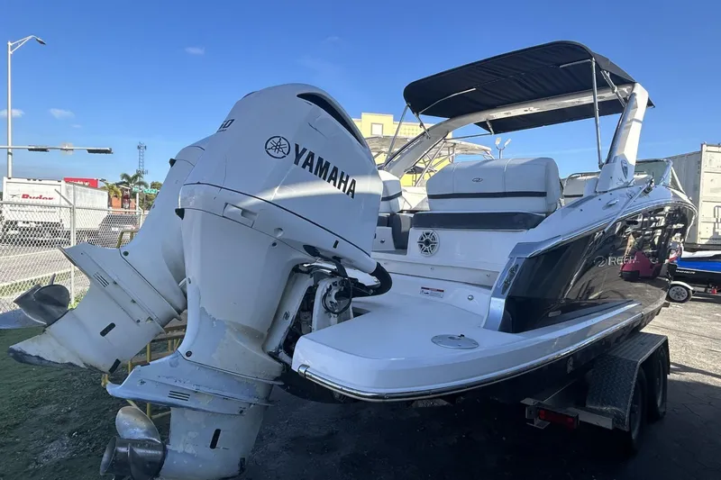 Slide: The Image of 2017 Regal 2900 Bowrider with Yamaha outboard engines, parked on a trailer. - 6