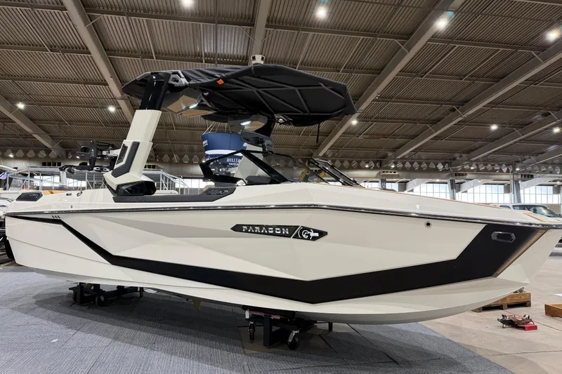 The Image of 2026 Nautique Super Air Nautique G25 Paragon boat displayed indoors. - 0