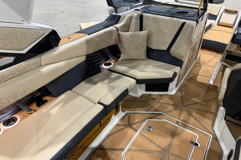 Slide: The Image of 2026 Nautique Super Air Nautique G25 Paragon interior with luxurious seating and modern design. - 12