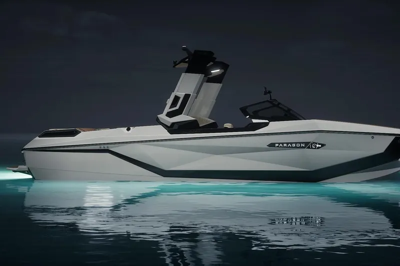 Slide: The Image of 2026 Nautique Super Air Nautique G25 Paragon displayed indoors at a boat show. - 2