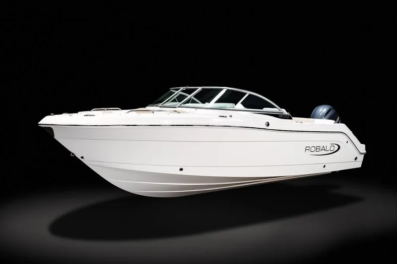 Slide: The Image of 2021 Robalo R227 Dual Console boat interior with open storage compartment. - 5