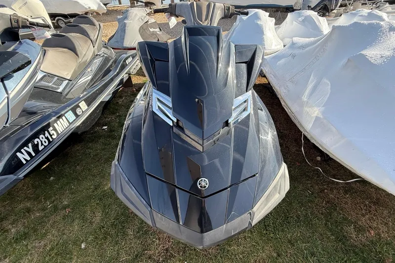 Slide: The Image of 2016 Yamaha WaveRunner FX HO jet ski parked on grass. - 9