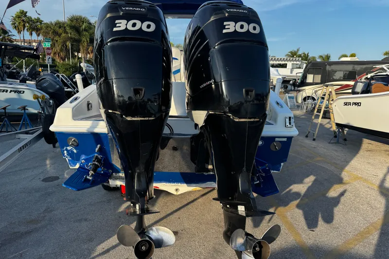 Slide: The Image of 2012 Renegade 32 CC boat with twin 300 Verado outboard engines. - 4