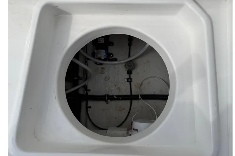 Slide: The Image of 2025 Sea Hunt Ultra 219 boat detail with sleek design and modern features. - 31