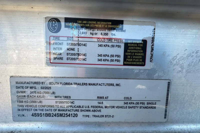 Slide: The Image of 2025 Sea Hunt Ultra 219 trailer tire and loading information label. - 68