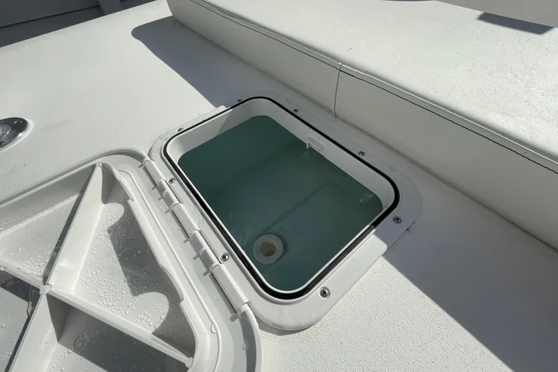 Slide: The Image of Open storage compartment on 2026 Delta Boatworks Delta D18 deck. - 5