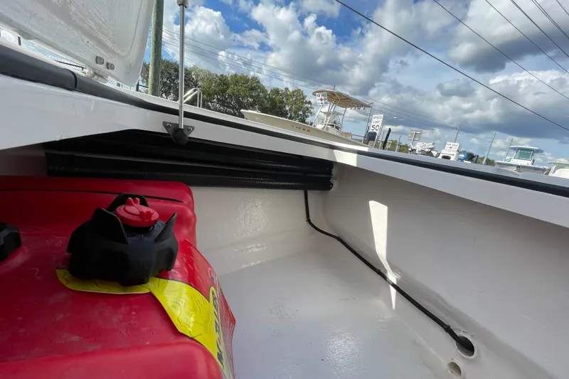 Slide: The Image of Interior view of 2026 Delta Boatworks Delta D18 with red fuel tank. - 9