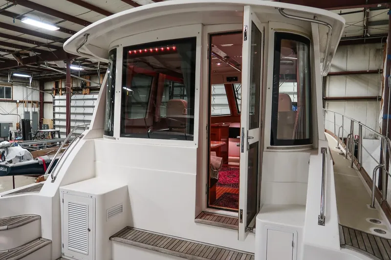 Slide: The Image of 2007 Grand Banks 39 Eastbay SX yacht interior view in a spacious warehouse. - 17