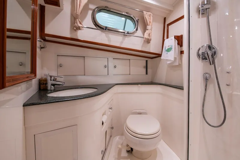 Slide: The Image of Luxurious bathroom in 2007 Grand Banks 39 Eastbay SX yacht with modern fixtures. - 37