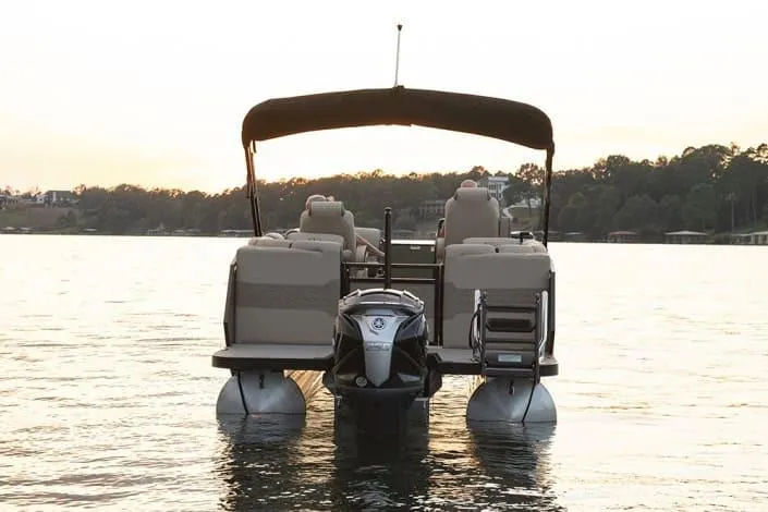 Slide: The Image of 2026 Veranda Relax VR235RCP pontoon boat on calm water at sunset. - 9