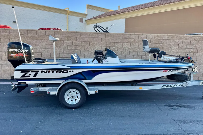 The Image of 2015 Nitro Z-7 boat on trailer, featuring Mercury Pro XS engine. - 0
