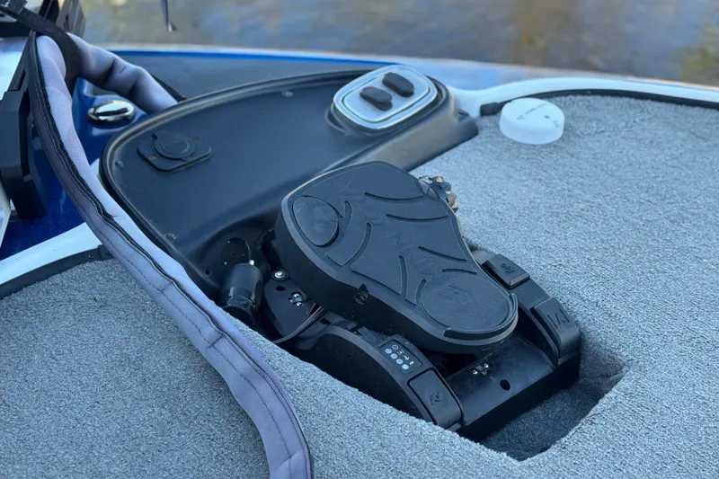 Slide: The Image of Foot pedal control on 2015 Nitro Z-7 boat deck, featuring textured surface and control buttons. - 11