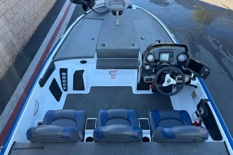 Slide: The Image of 2015 Nitro Z-7 boat interior with steering console and seating arrangement. - 13