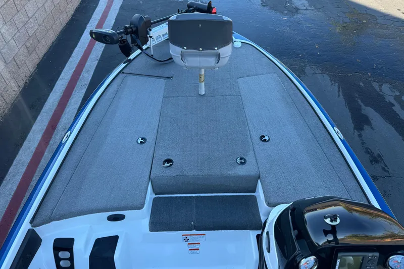 Slide: The Image of 2015 Nitro Z-7 boat deck with gray seating and mounted equipment. - 14