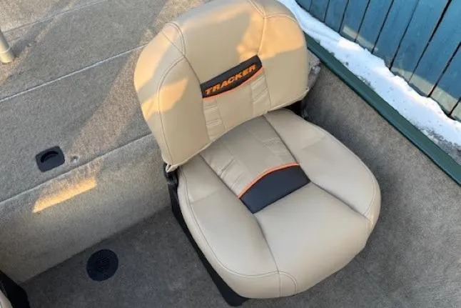Slide: The Image of 2026 Tracker Bass Tracker Classic Limited boat seat, beige with black and orange accents. - 12