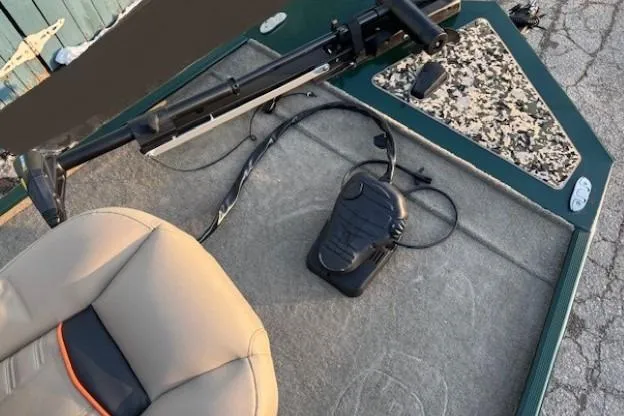 Slide: The Image of 2026 Tracker Bass Tracker Classic Limited boat interior with seat and foot pedal. - 5