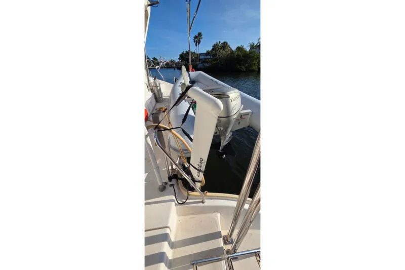 Slide: The Image of 2004 Leopard 47 boat with Honda outboard motor on a sunny day. - 15