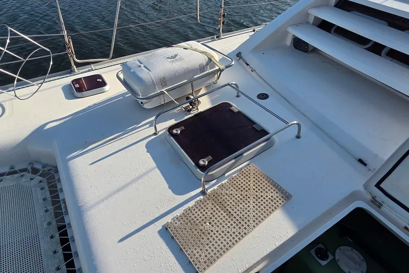 Slide: The Image of Deck of 2004 Leopard 47 catamaran with safety equipment and hatch. - 21