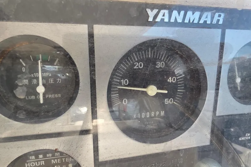 Slide: The Image of Close-up of Yanmar engine gauges on a 2004 Leopard 47 yacht. - 37