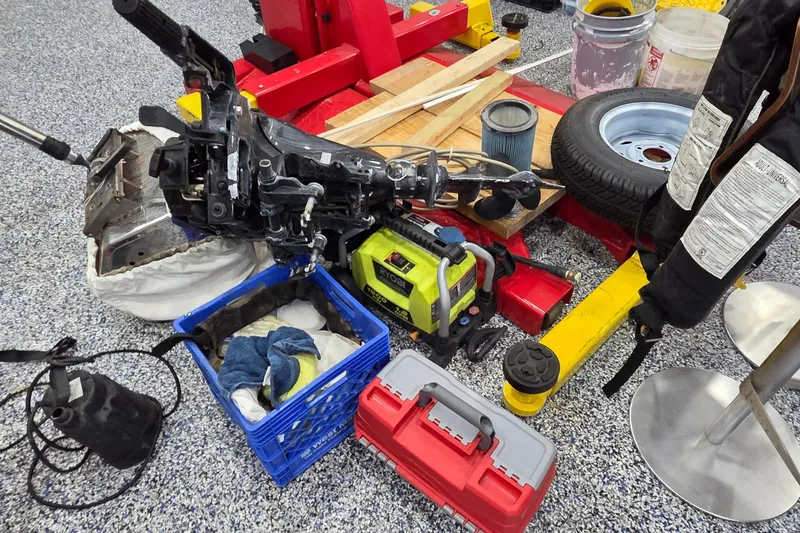 Slide: The Image of Workshop tools and equipment for Leopard 47, 2004 model, including tire and air compressor. - 80