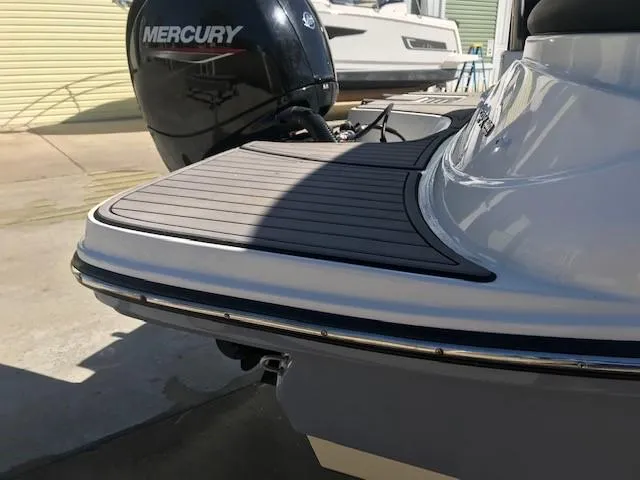 Slide: The Image of 2022 Sea Ray SPX 190 OB boat with Mercury outboard motor, rear deck view. - 13