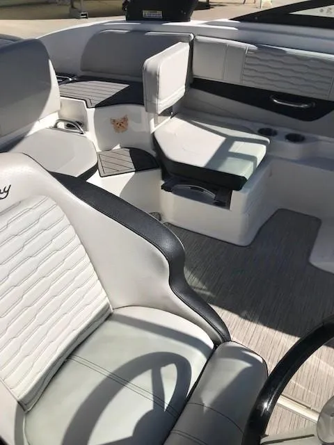 Slide: The Image of 2022 Sea Ray SPX 190 OB boat interior with white seating and modern design. - 31