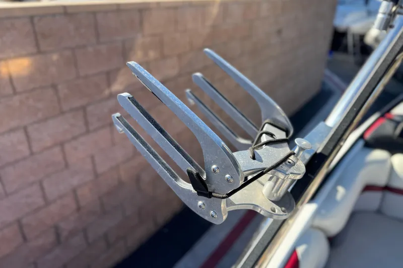 Slide: The Image of Close-up of a 2012 Malibu Wakesetter 21 VLX wakeboard rack. - 10