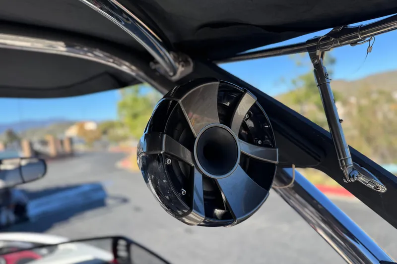 Slide: The Image of 2012 Malibu Wakesetter 21 VLX boat speaker detail under canopy. - 11