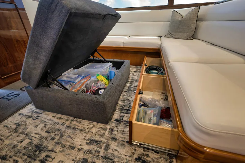 Slide: The Image of Interior storage of 2004 Guthrie 60 Custom Carolina yacht with open compartments. - 12