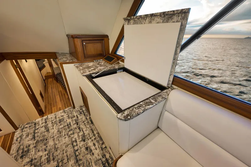 Slide: The Image of Interior of 2004 Guthrie 60 Custom Carolina yacht with ocean view and elegant wood finish. - 14