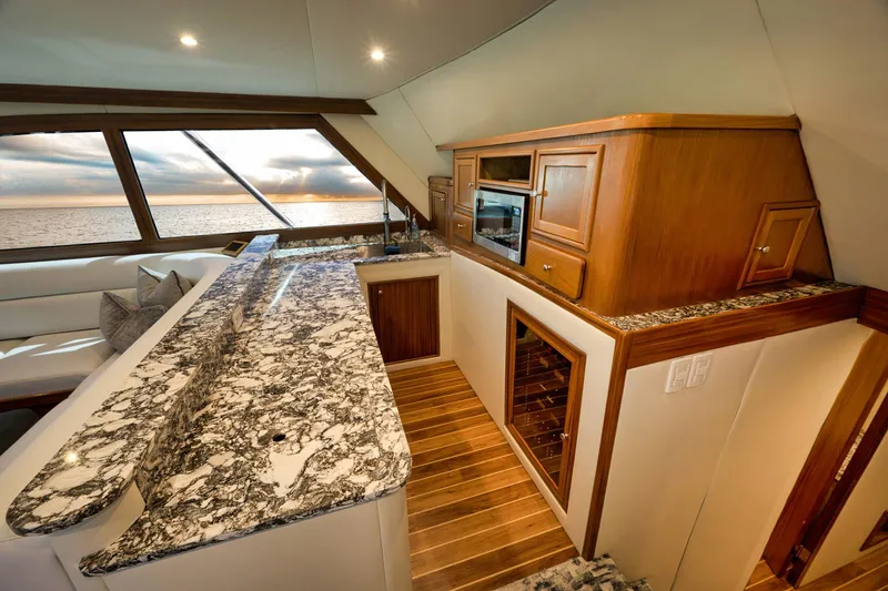 Slide: The Image of Luxurious 2004 Guthrie 60 Custom Carolina yacht interior with elegant kitchen and ocean view. - 20