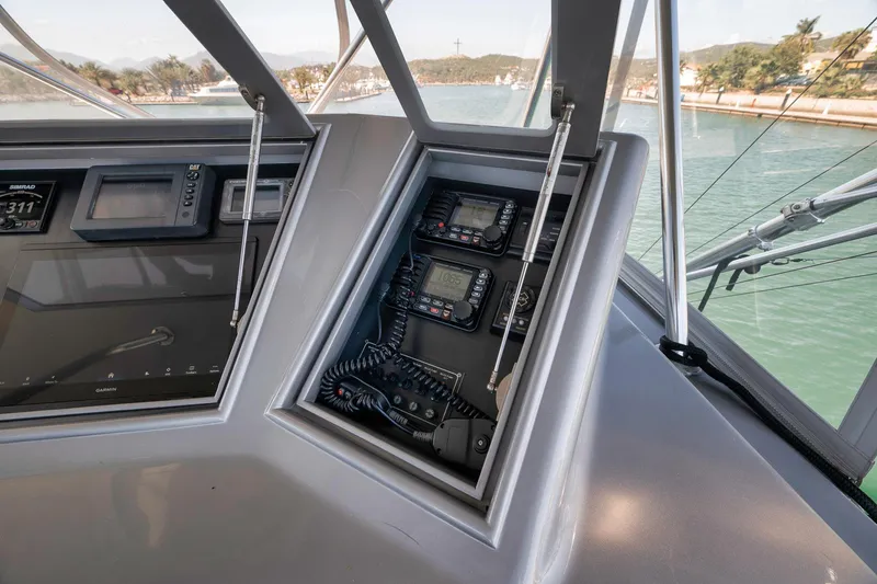 Slide: The Image of Control panel of 2004 Guthrie 60 Custom Carolina boat with navigation equipment. - 50