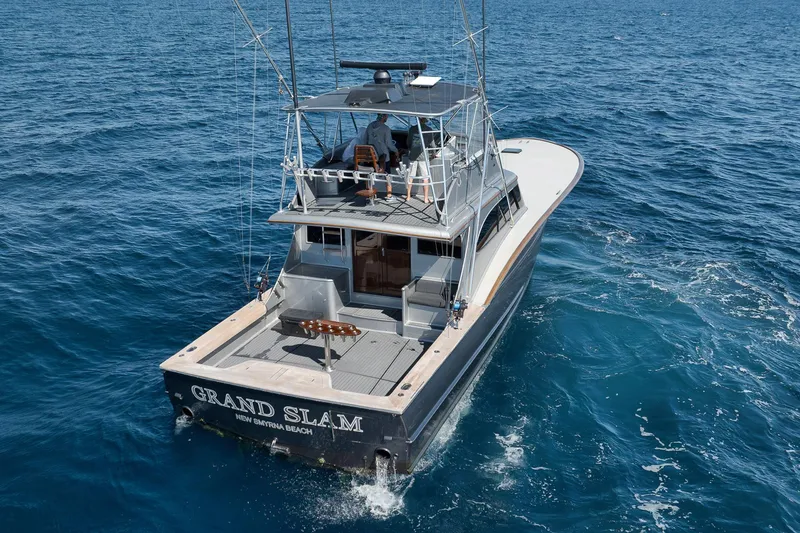 Slide: The Image of 2004 Guthrie 60 Custom Carolina yacht cruising on open ocean waters. - 81