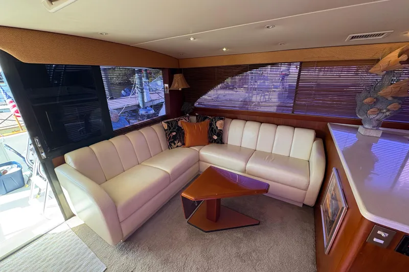 Slide: The Image of Luxurious interior of 1996 Ocean Yachts 48 Super Sport with elegant seating and decor. - 16